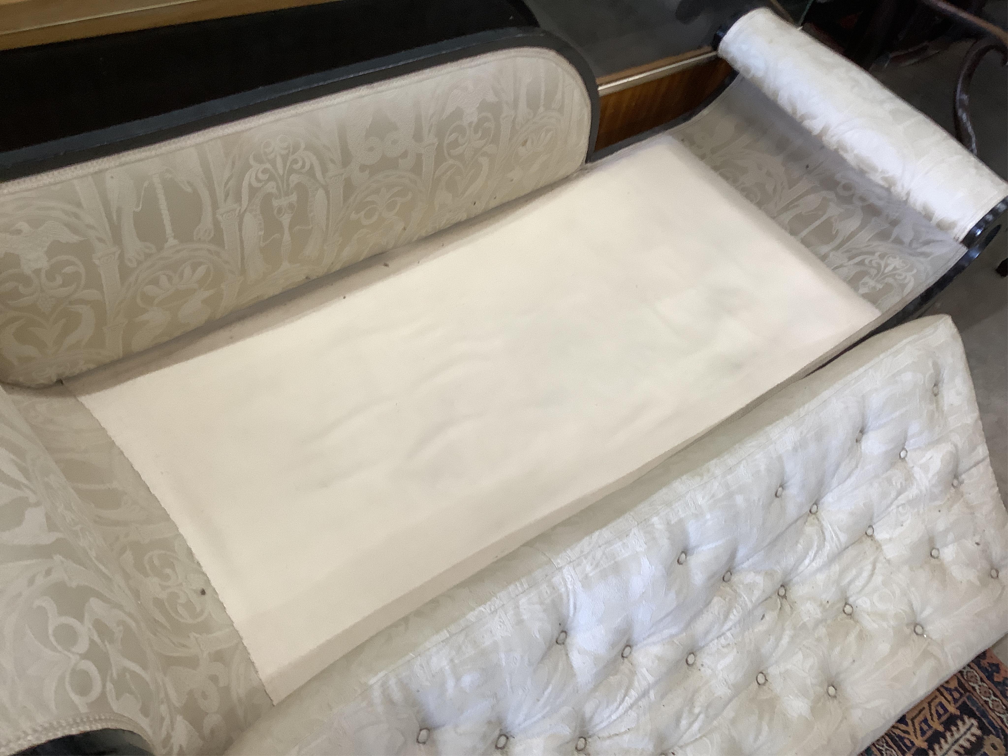 A Regency upholstered chaise longue, later painted, width 184cm, depth 62cm, height 76cm. Condition - fair